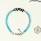 Personalized Turquoise Howlite Bracelet with Clasp beside a dime.