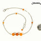 Natural Carnelian and Chain Choker Necklace beside a dime.