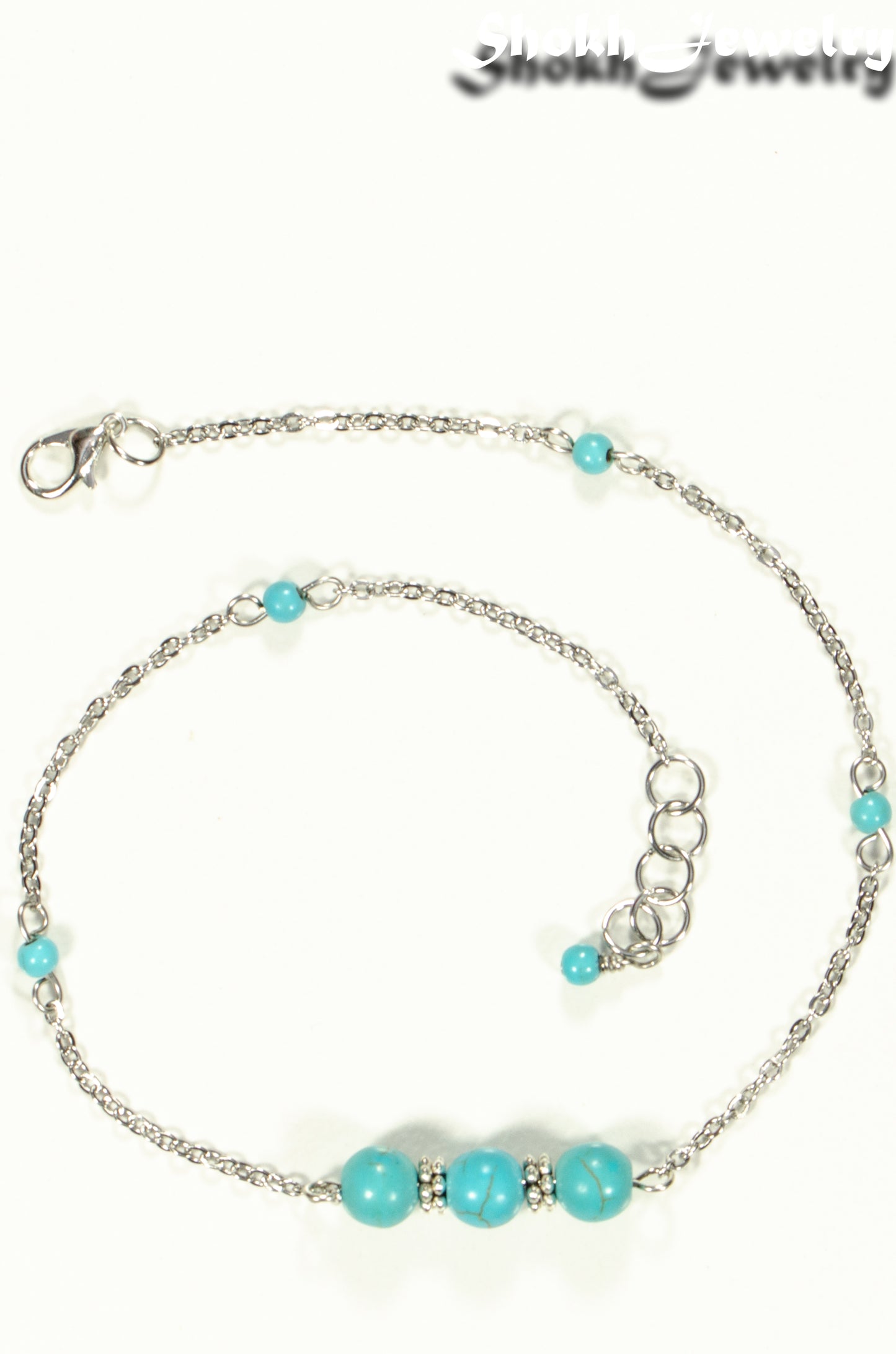 Top view of Natural Turquoise Howlite and Chain Choker Necklace.