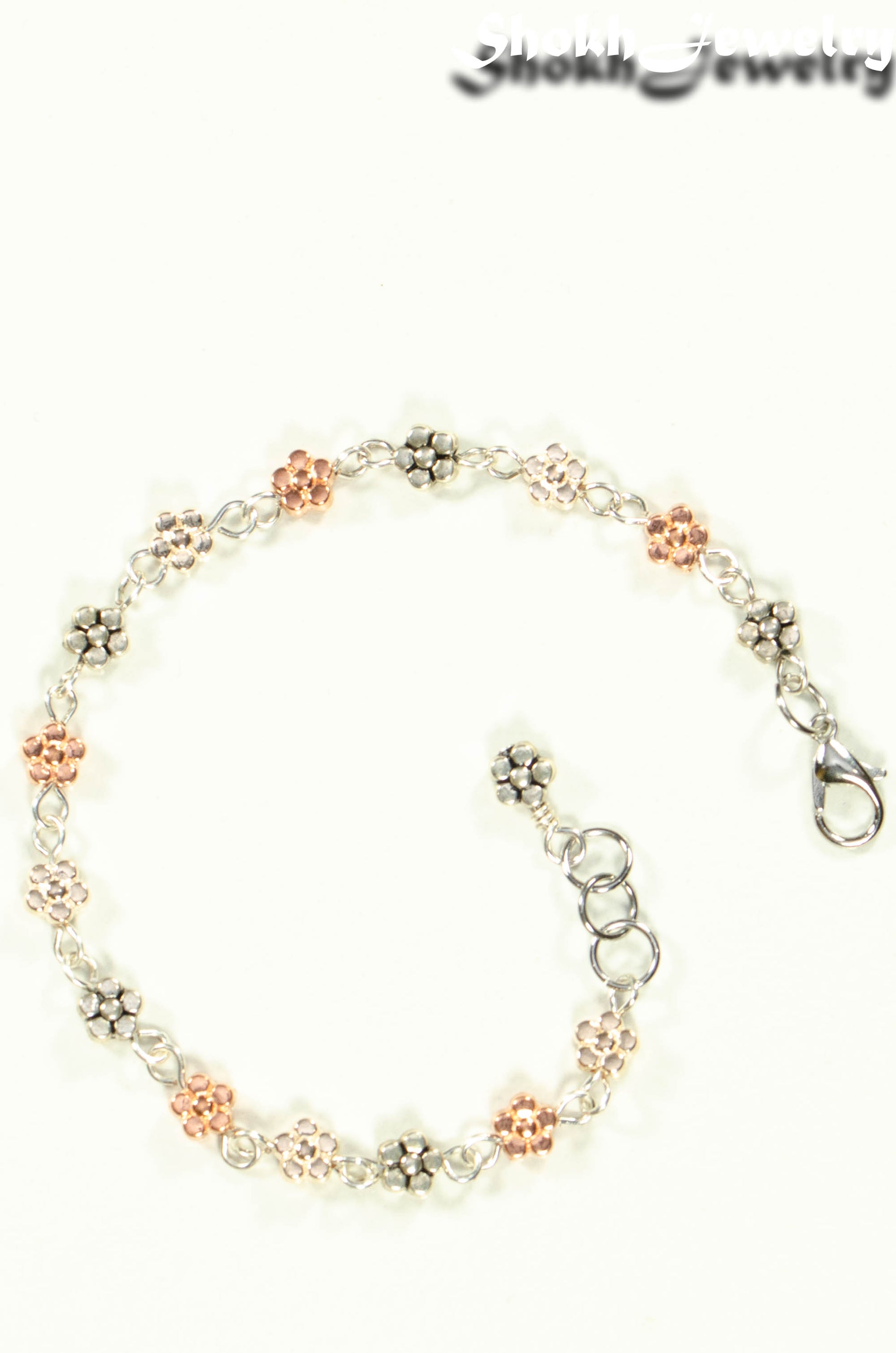 Top view of Multi Metal Flower Link Bracelet.