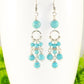 Close up of Statement Turquoise Howlite Chandelier Earrings.