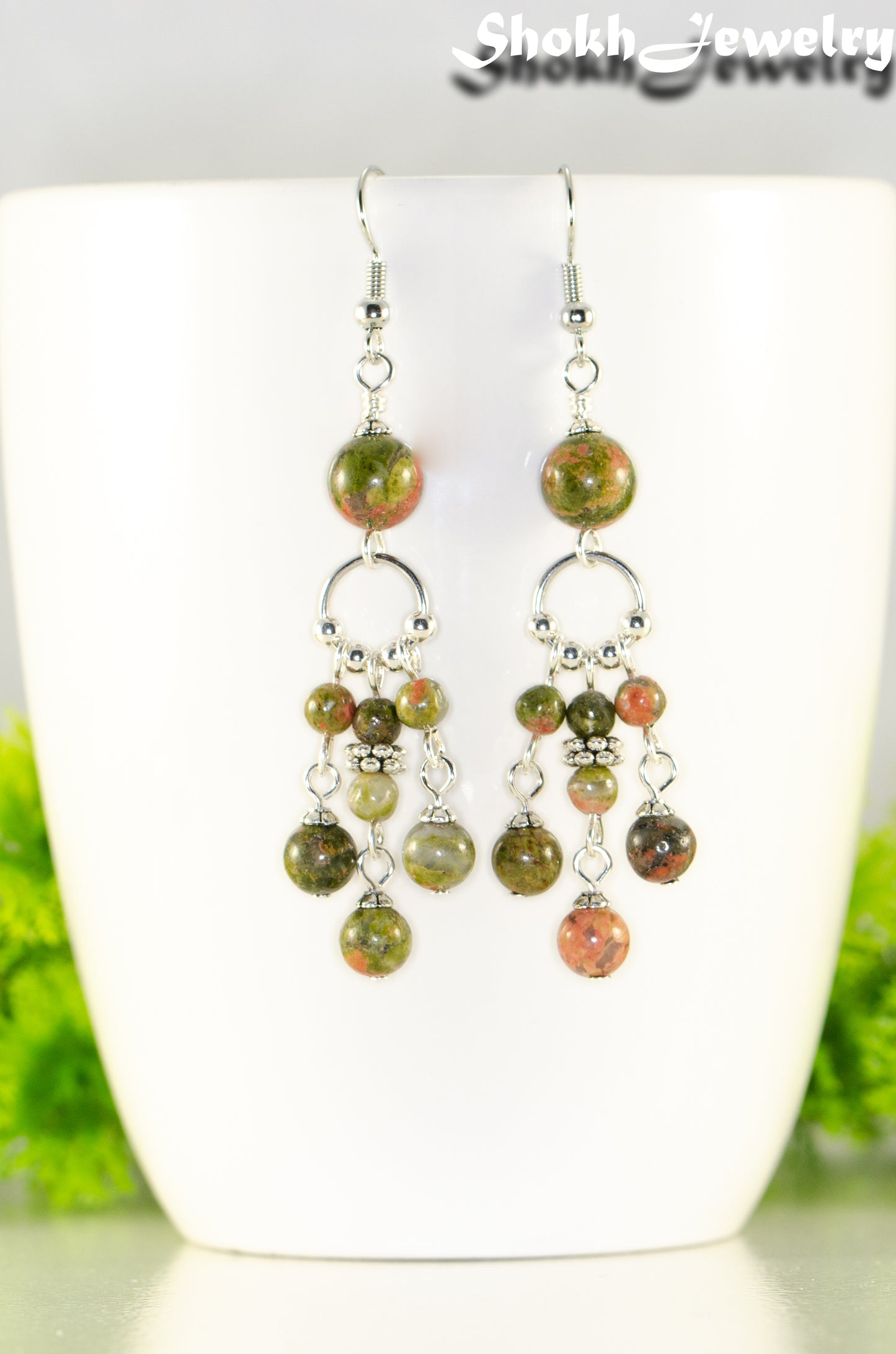 Close up of Statement Unakite Jasper Chandelier Earrings.