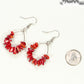 Natural Red Coral Crystal Chip Earrings beside a dime.