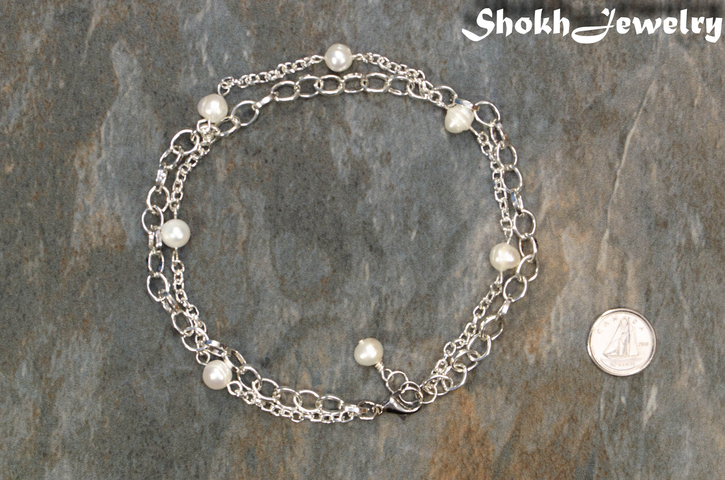 Double Layered Chain and Freshwater Pearl Anklet beside a dime.