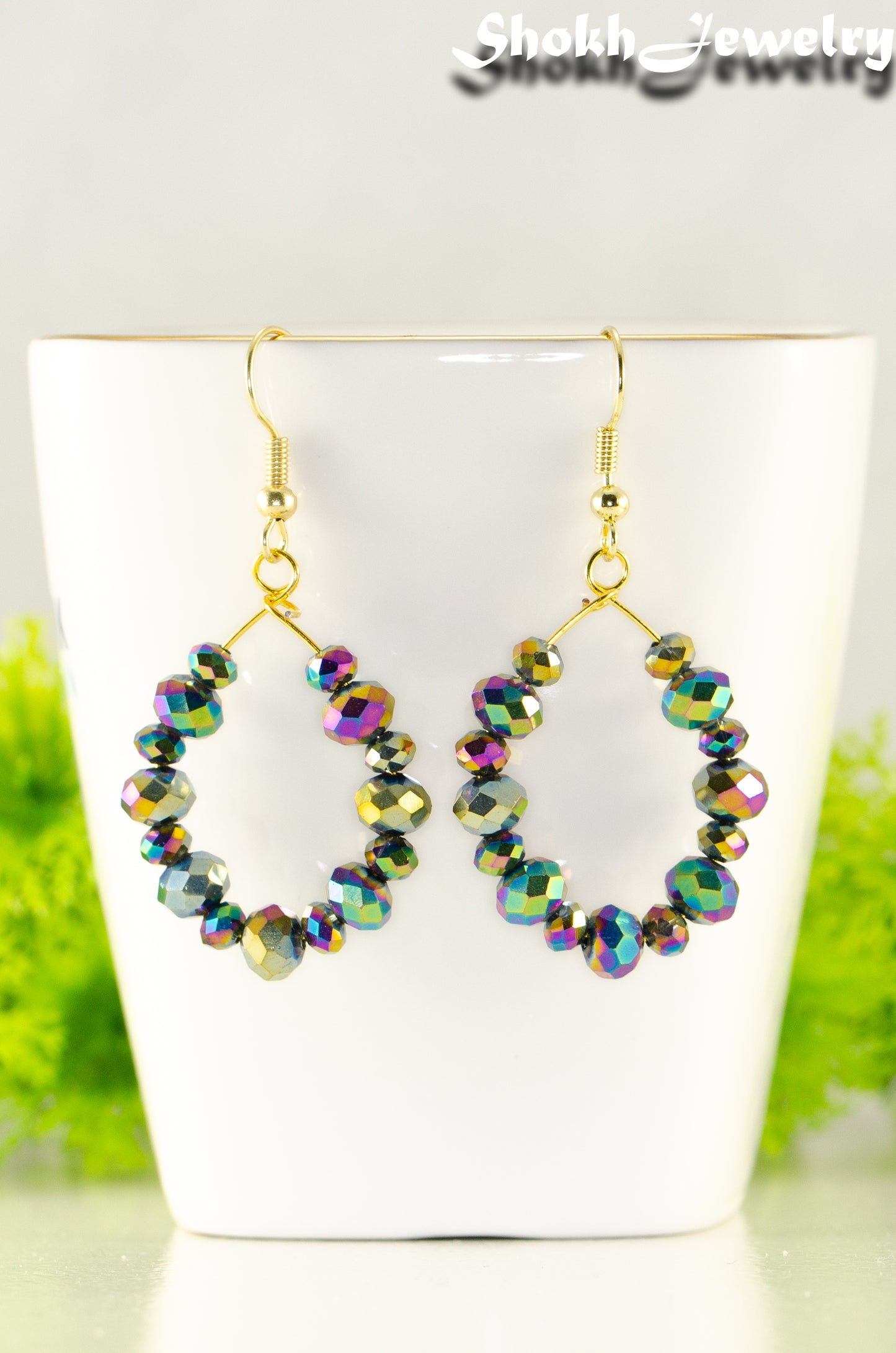 Close up of Sparkly Rainbow Glass Crystal Hoop Earrings.