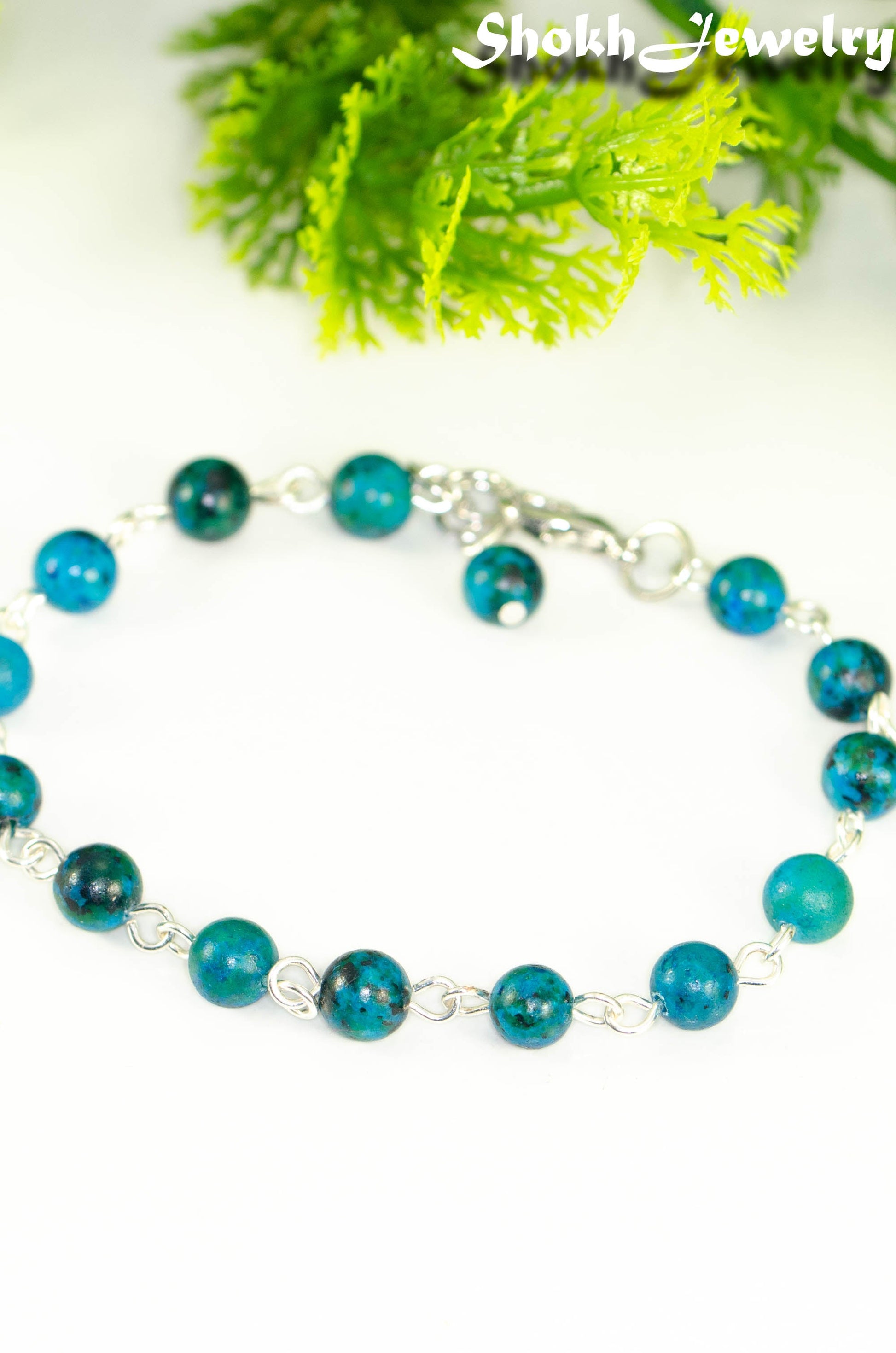 Close up of 6mm Blue Jade Link chain anklet.