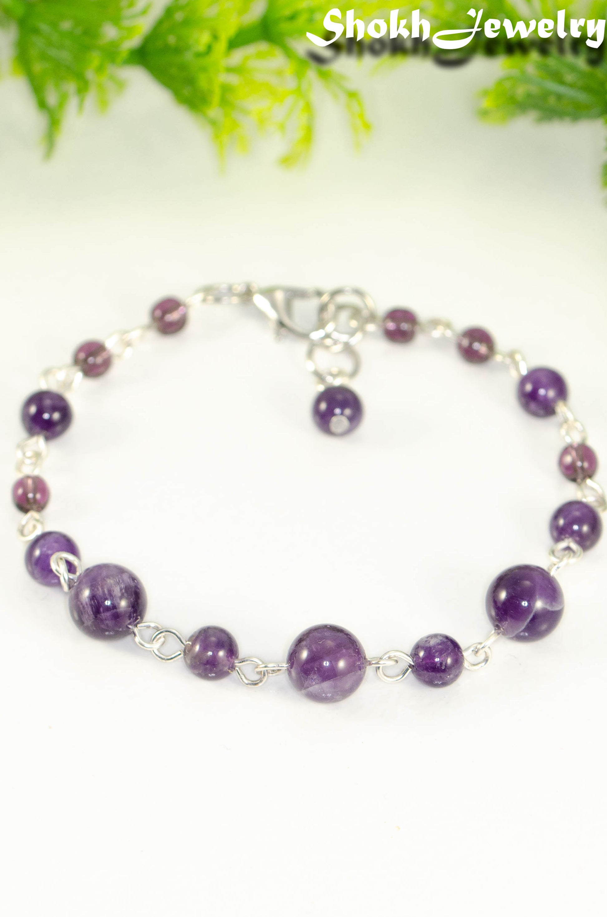 Close up of Handmade Amethyst Link Chain Bracelet.