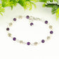 Tibetan Silver Flower and Amethyst Link Bracelet with lobster claw clasp closure.