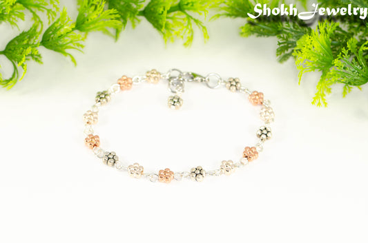 Multi Metal Flower Link Bracelet with clasp.