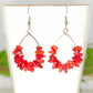 Close up of Natural Red Coral Crystal Chip Earrings.