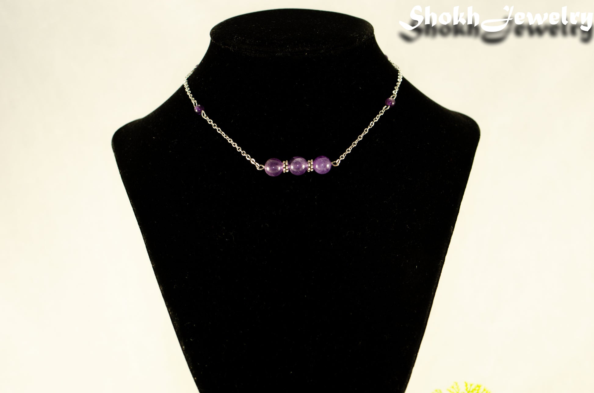 Natural Amethyst and Chain Choker Necklace displayed on a bust.