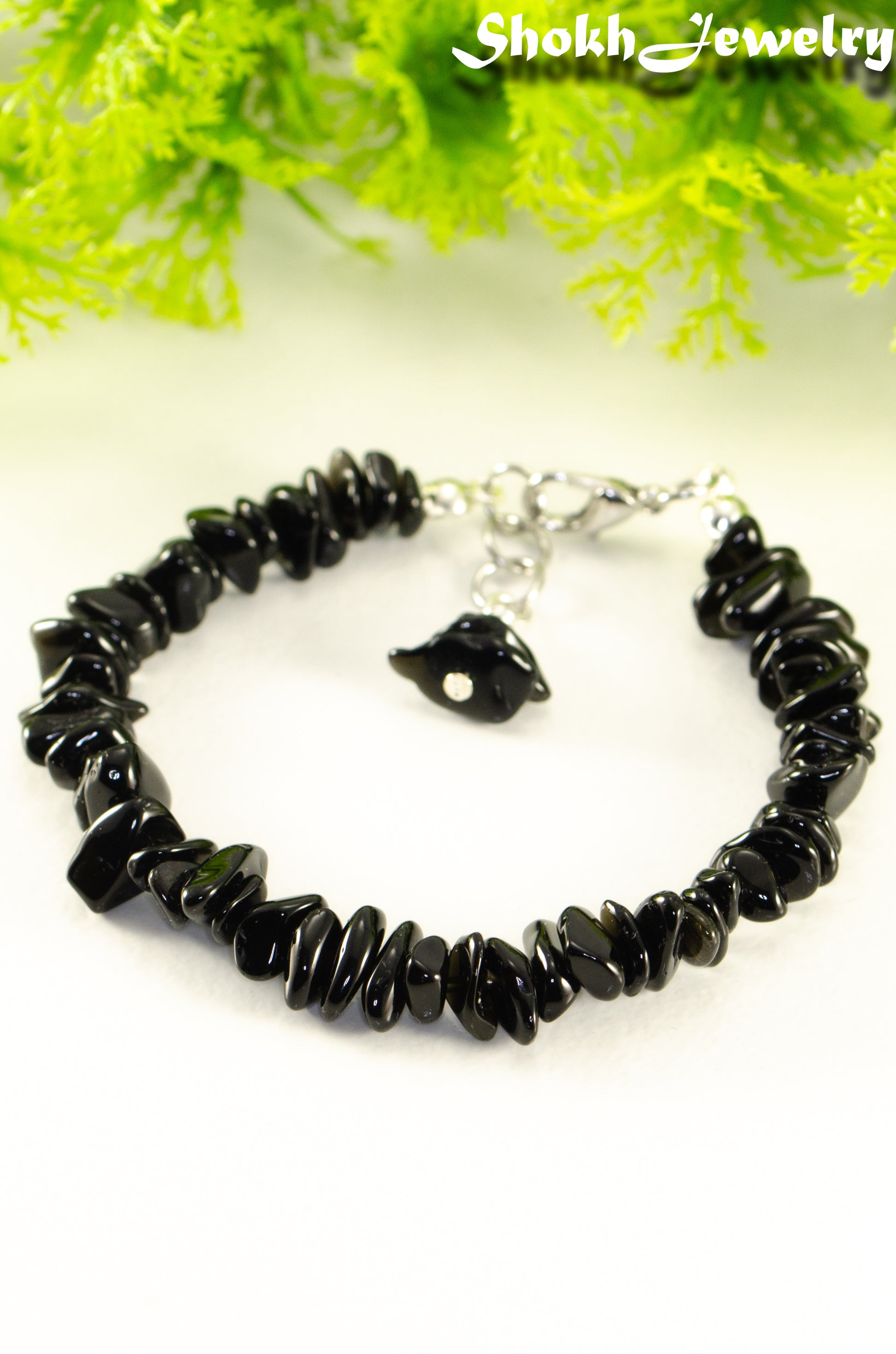 Close up of Natural Black Obsidian Crystal Chip Bracelet.