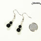 Small Black Tourmaline Earrings beside a dime.