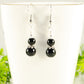 Close up of Small Black Tourmaline Earrings.