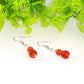 Close up of Small Natural Fire Agate Earrings.