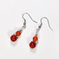 Top view of Small Natural Fire Agate Earrings.