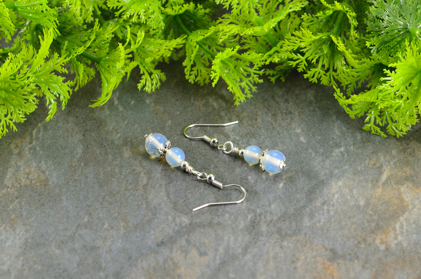 Close up of Small Opalite Crystal Earrings.