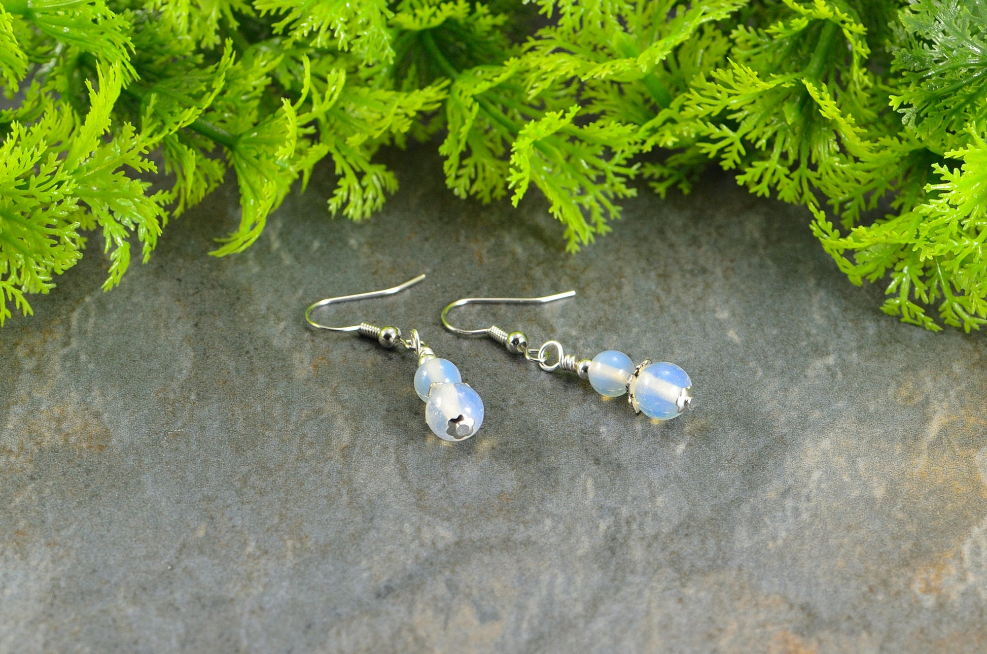 Close up of Small Opalite Crystal Earrings.