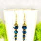 Close up of Sparkly Blue Glass Crystal Bead Earrings.