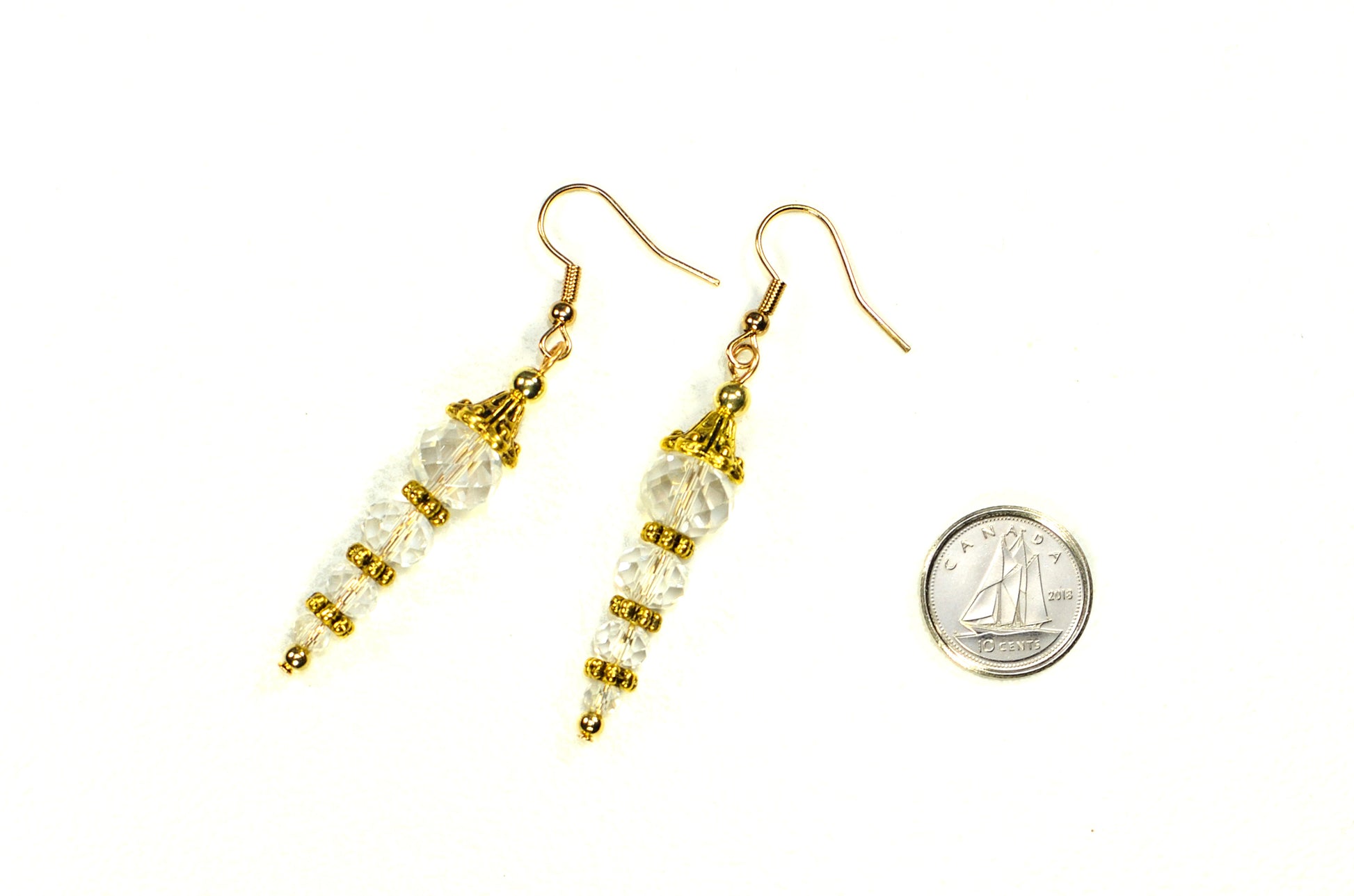 Sparkly Crystal Clear Glass Bead Earrings beside a dime.