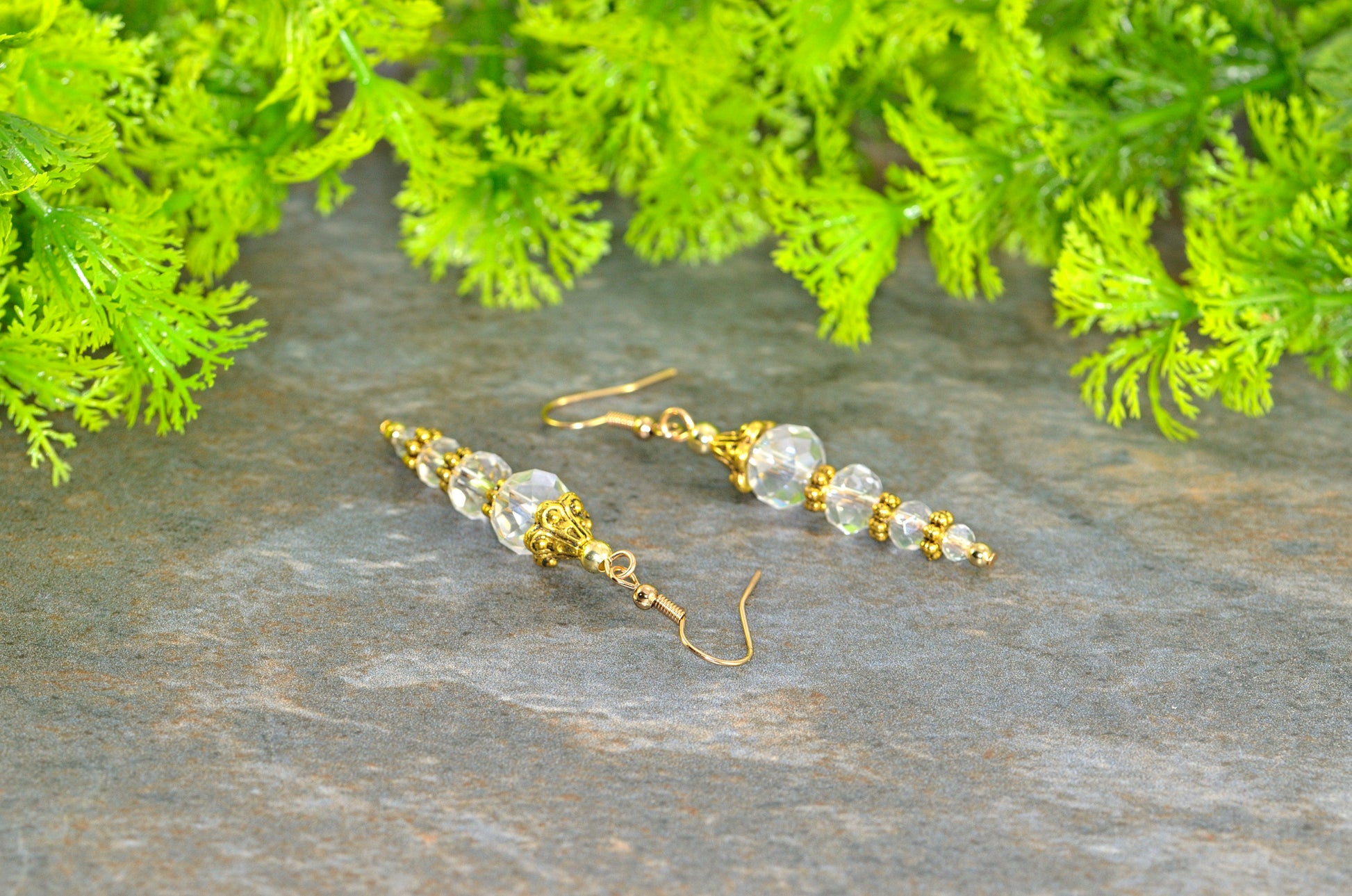 Close up of Sparkly Crystal Clear Glass Bead Earrings.