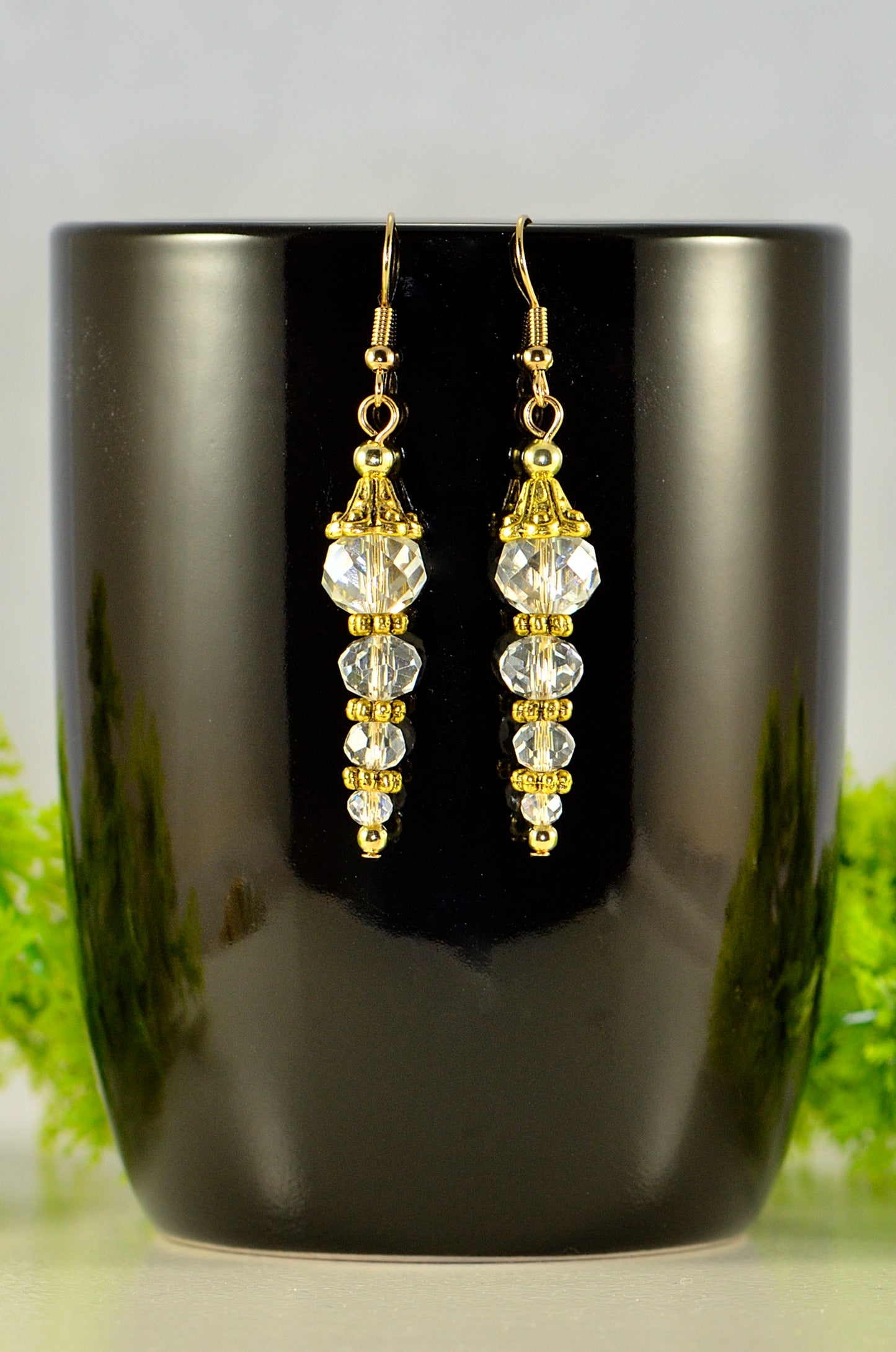 Close up of Sparkly Crystal Clear Glass Bead Earrings.