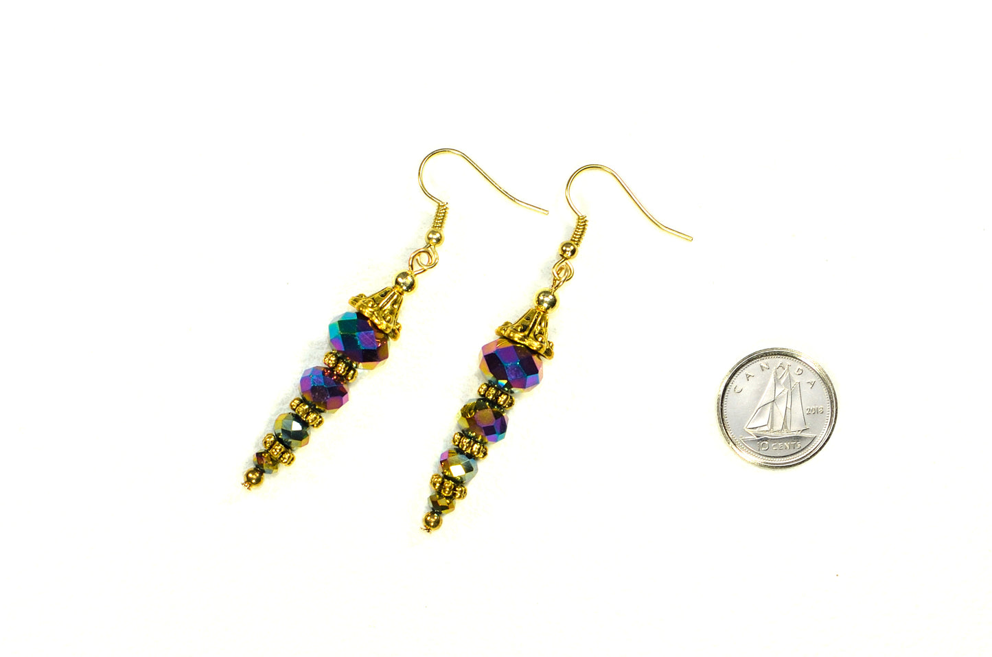 Sparkly Gold Glass Crystal Bead Earrings beside a dime.