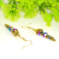 Close up of Sparkly Gold Glass Crystal Bead Earrings.