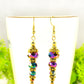 Close up of Sparkly Gold Glass Crystal Bead Earrings.