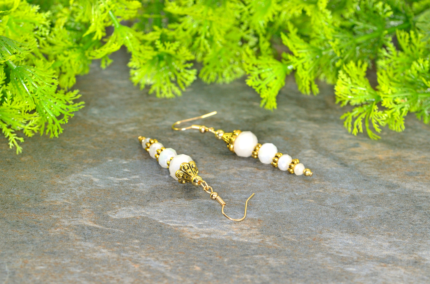 Close up of Sparkly White Glass Crystal Bead Earrings.