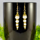 Close up of Sparkly White Glass Crystal Bead Earrings.