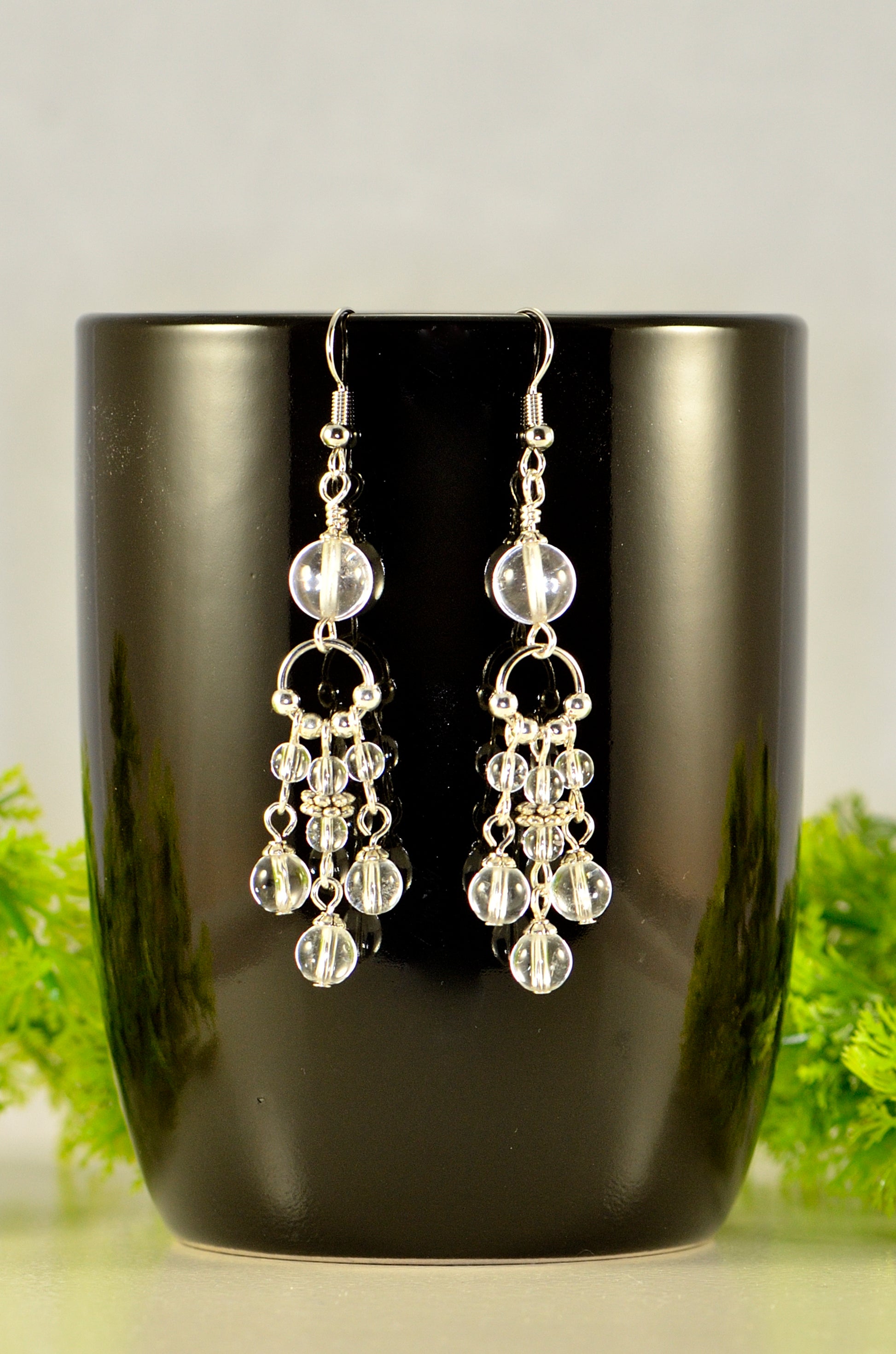 Close up of Statement Clear Quartz Chandelier Earrings.