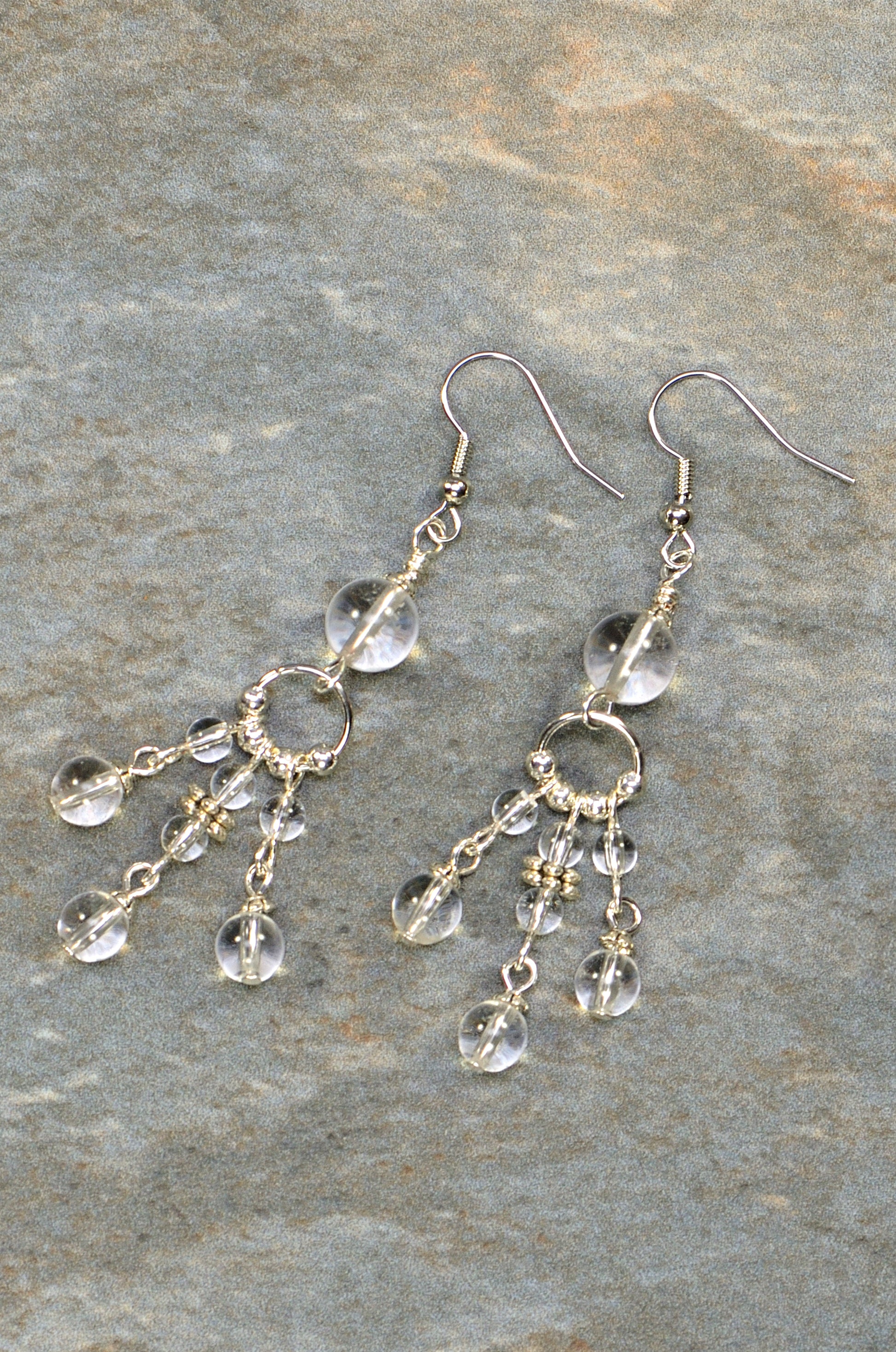 Top view of Statement Clear Quartz Chandelier Earrings.