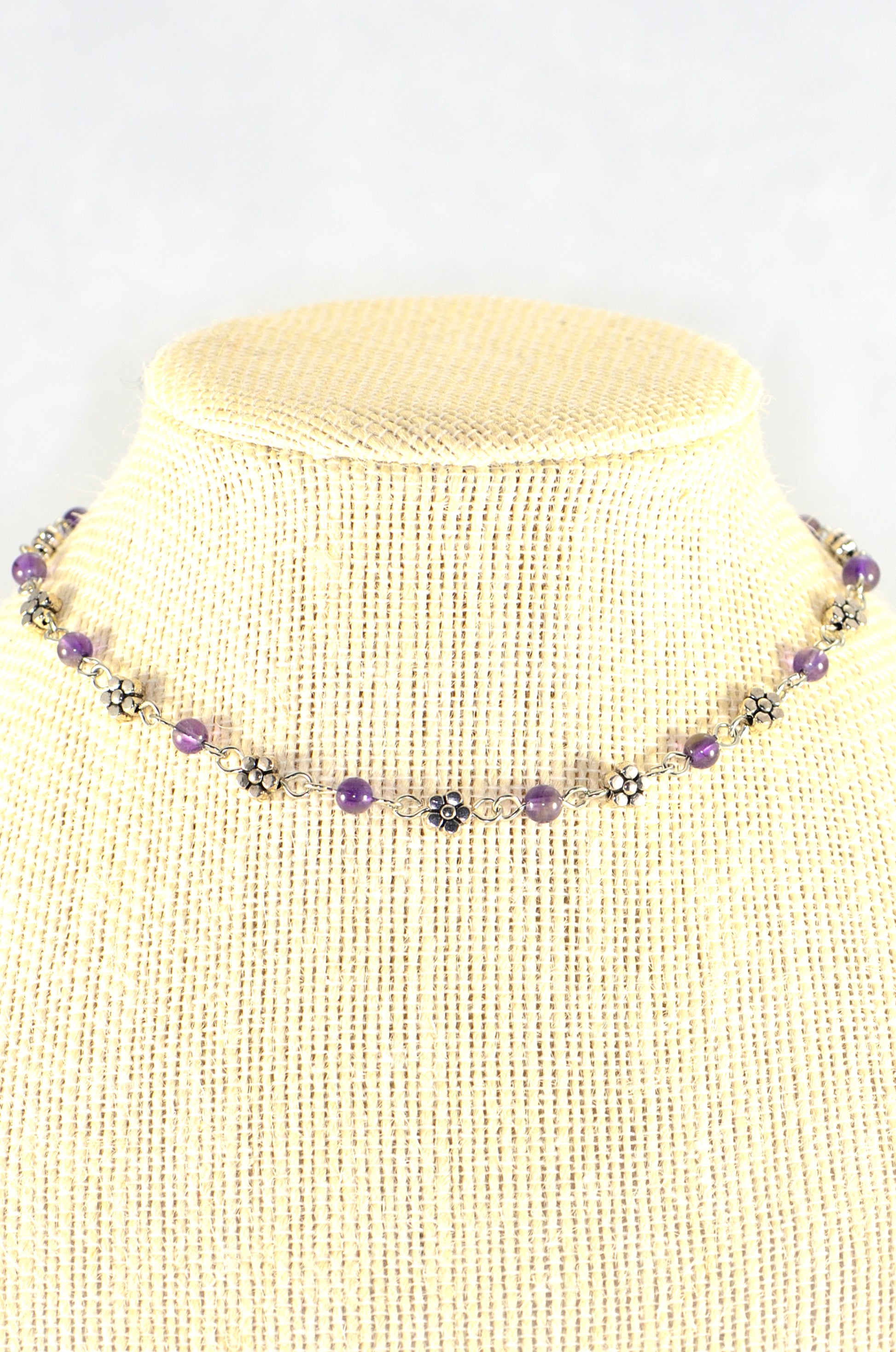 Close up of Tibetan Silver Flower and Amethyst Choker Necklace.