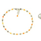 Tibetan Silver Flower and Carnelian Choker Necklace beside a dime.
