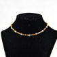 Tibetan Silver Flower and Carnelian Choker Necklace displayed on a bust.