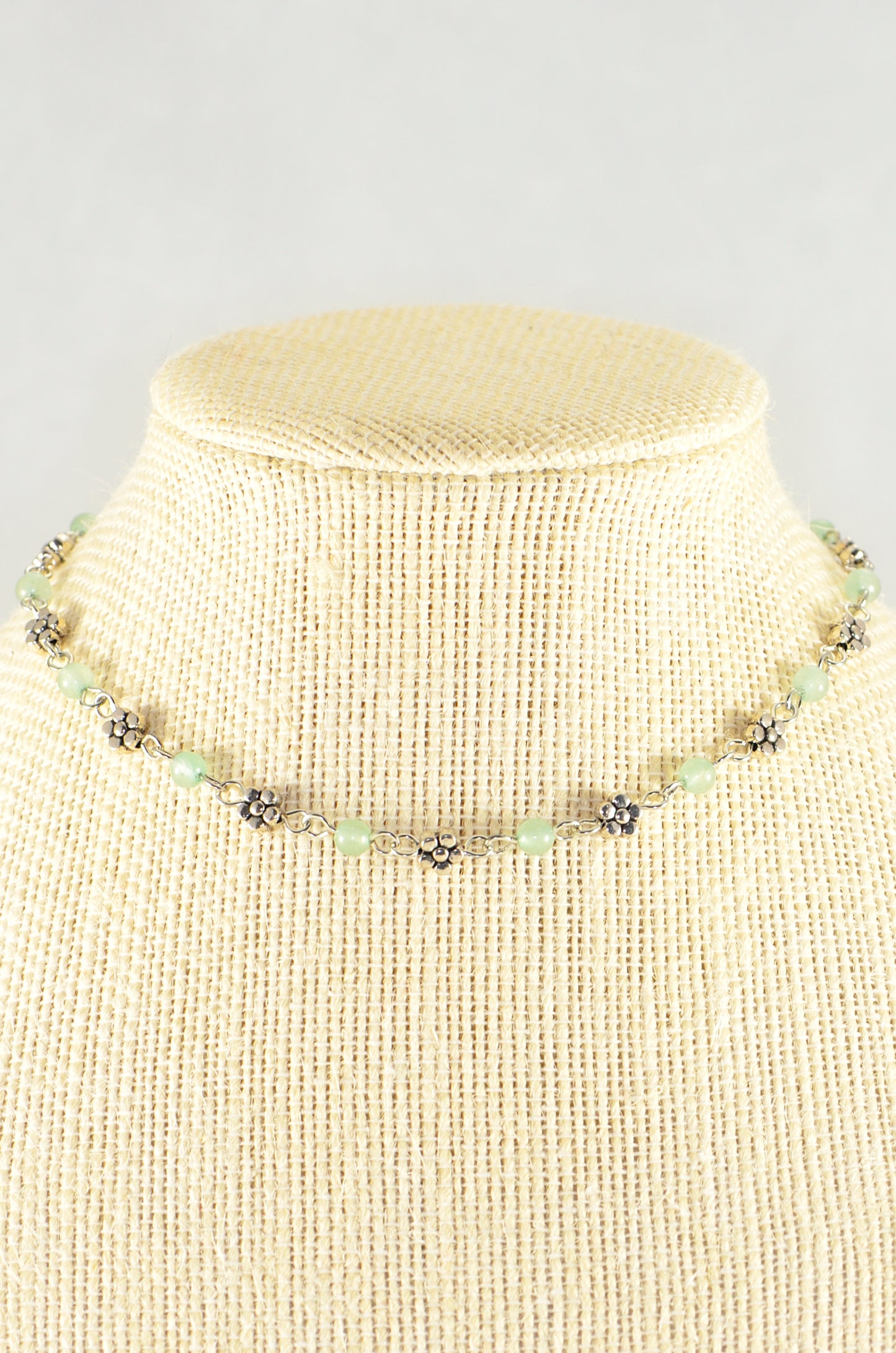 Close up of Tibetan Silver Flower and Green Aventurine Choker Necklace.
