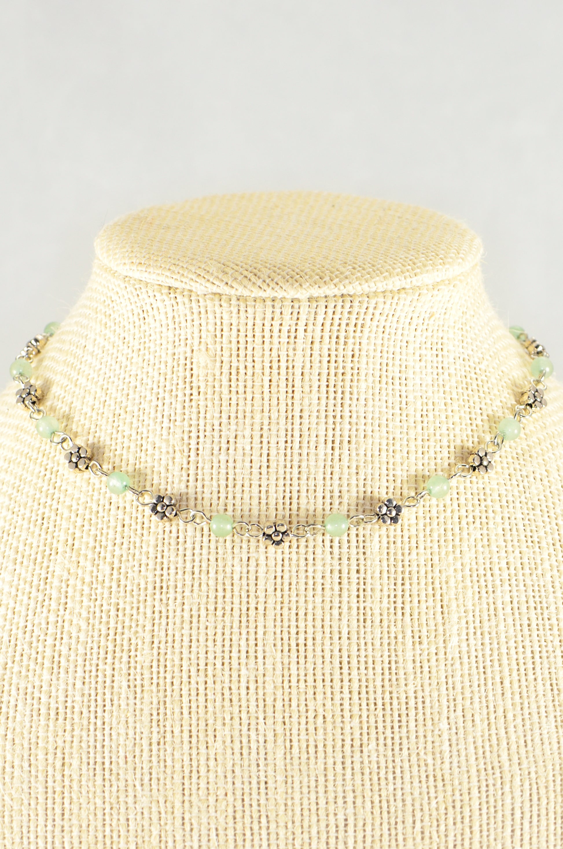 Close up of Tibetan Silver Flower and Green Aventurine Choker Necklace.