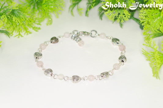 Tibetan Silver Heart and Rose Quartz Link Bracelet with lobster claw clasp and a dangle.