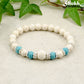 Top view of White Howlite and Lava Stone Bracelet.