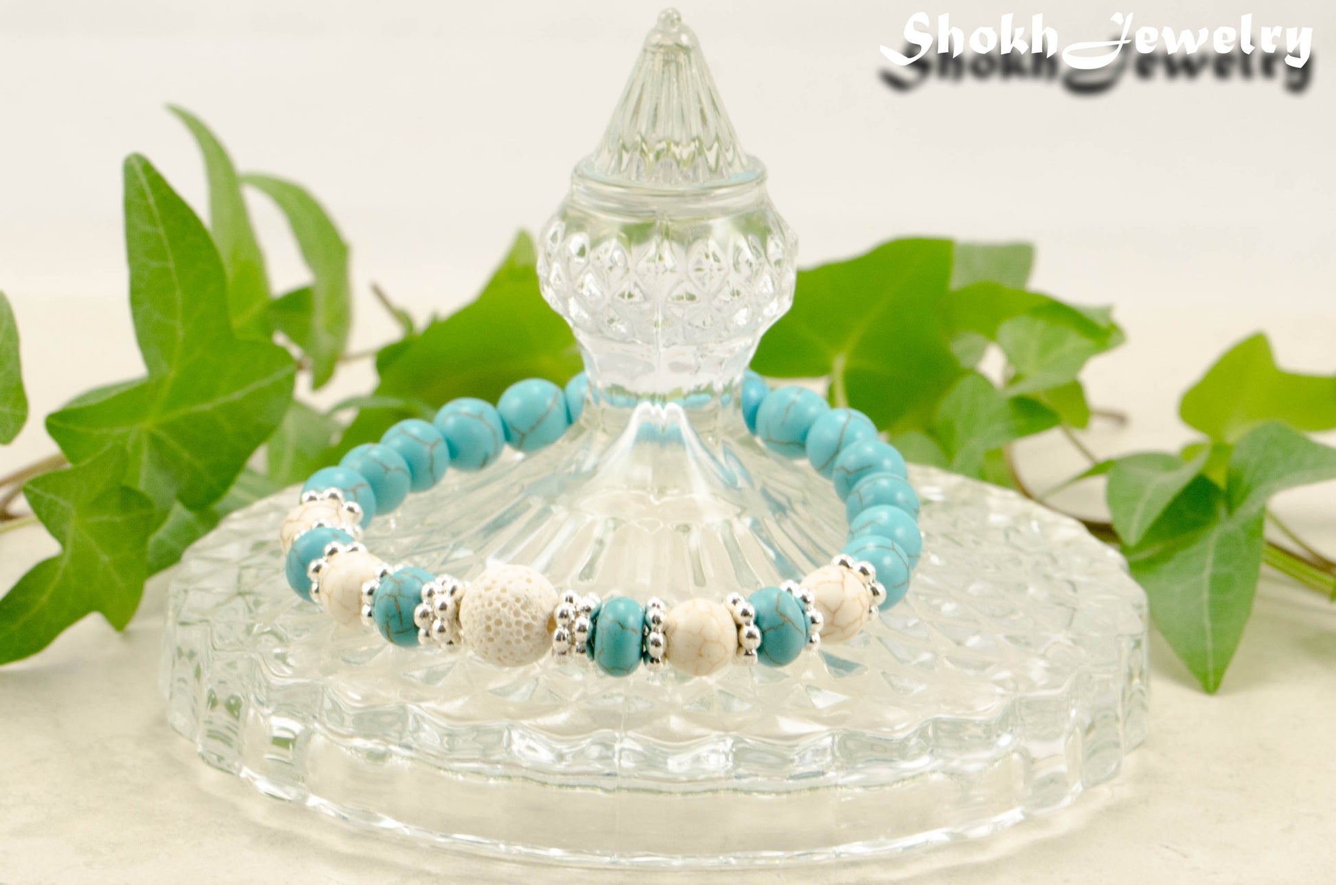 Turquoise Howlite and Lava Stone Bracelet with white howlite accent beads.