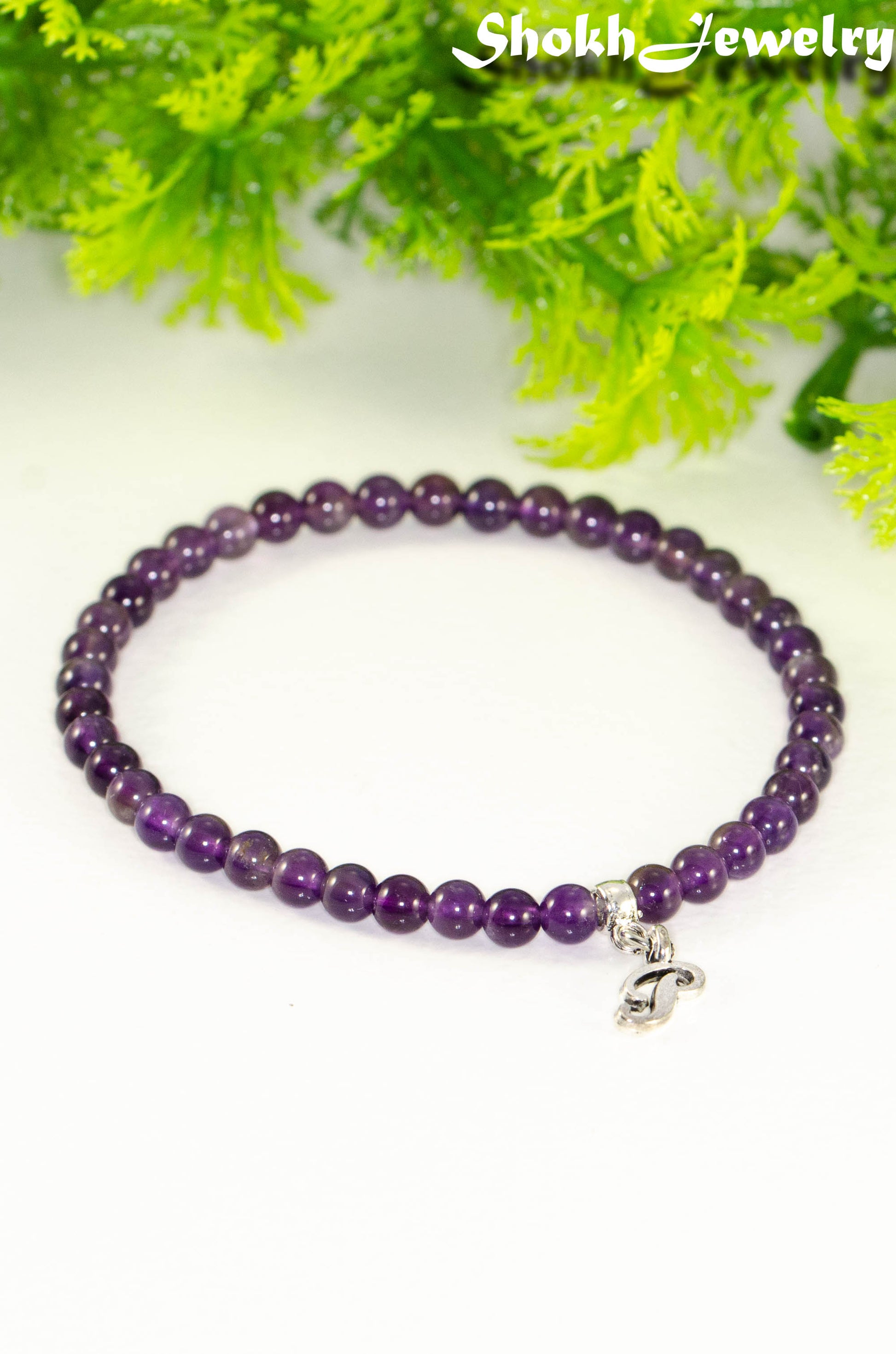 Close up of 4mm Amethyst Bracelet with Initial