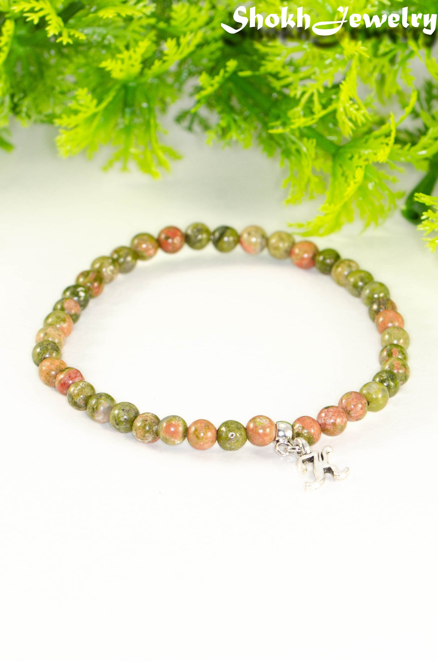 Close up of 4mm Unakite Bracelet with Initial.