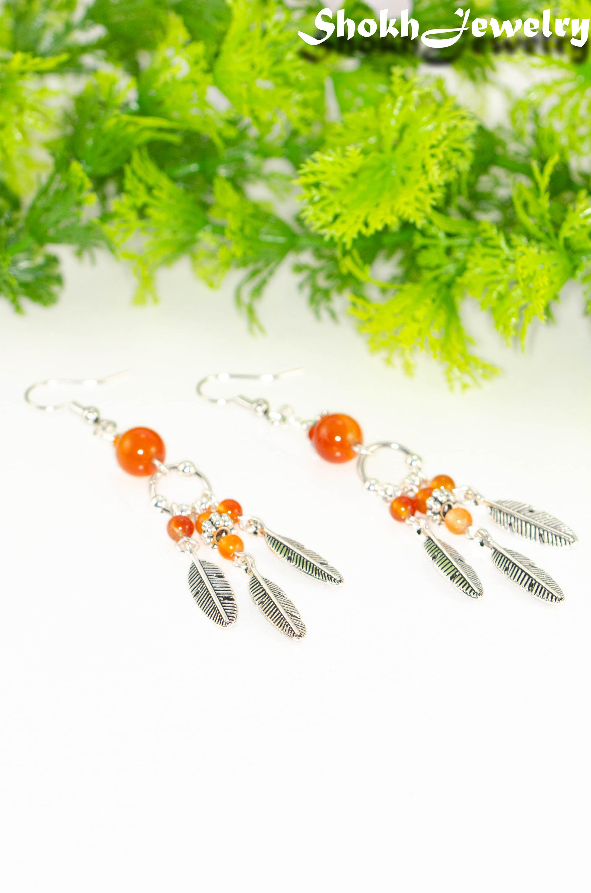 Statement Carnelian Crystal And Feather Earrings.