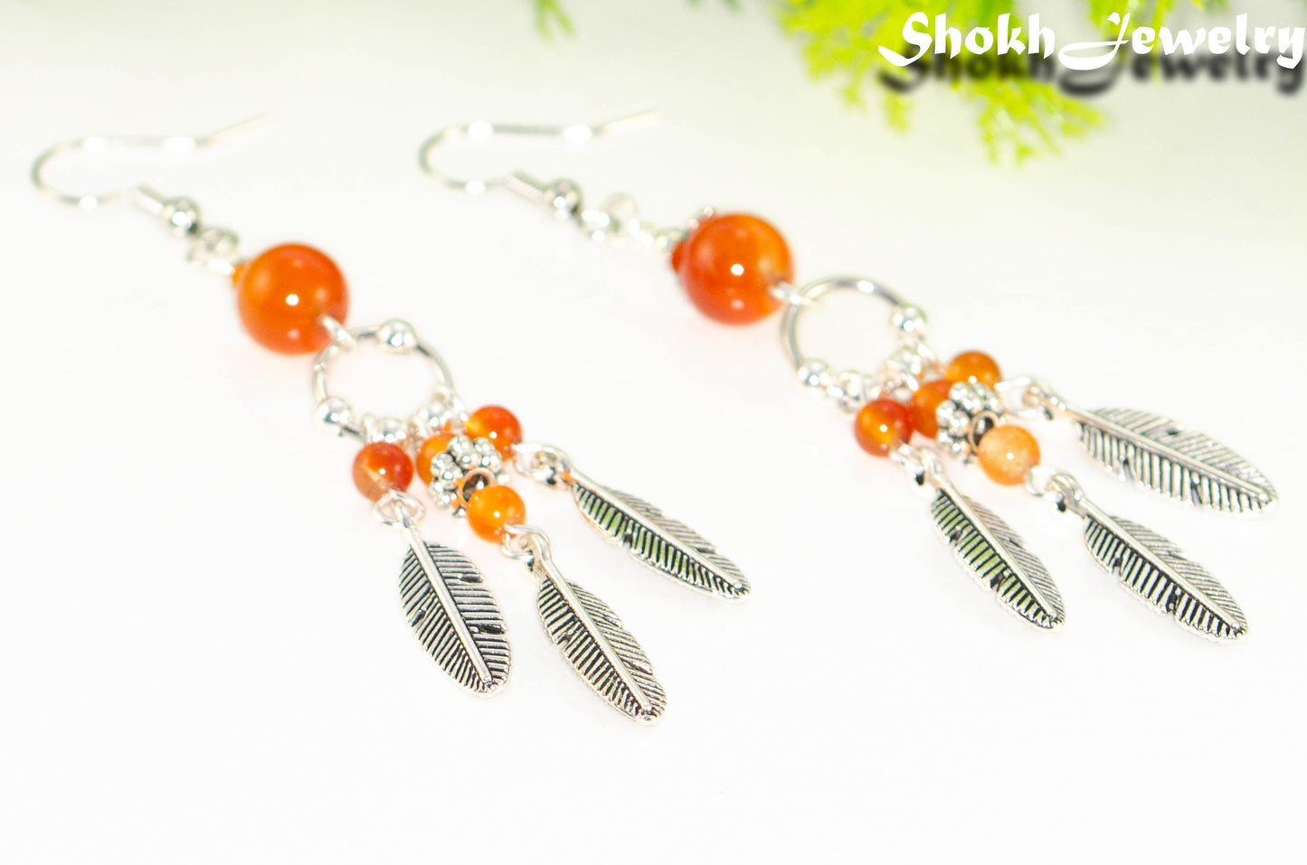 Statement Carnelian Crystal And Feather Earrings.