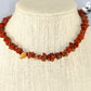 Natural Red Jasper Crystal Chip Choker Necklace displayed on a bust