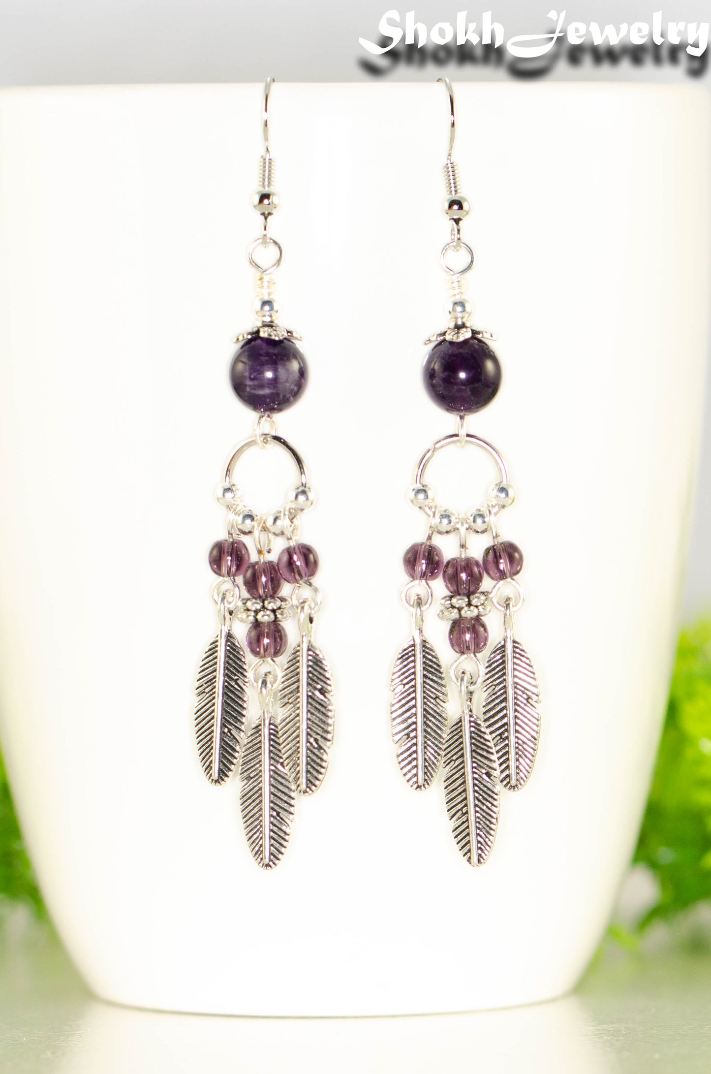 Statement Amethyst Crystal And Feather Earrings.