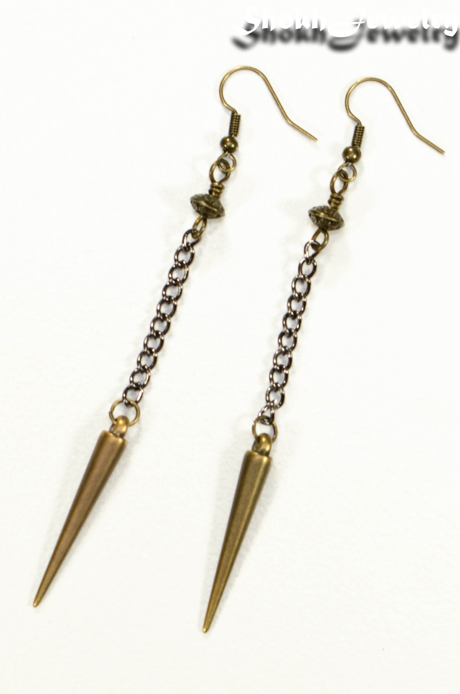 Statement chain and antique bronze spike earrings