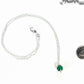 Dainty Malachite Choker Necklace beside a dime