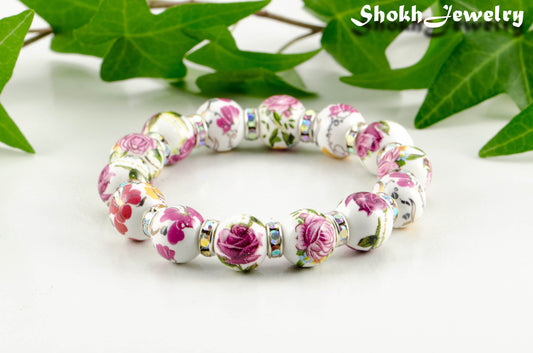 12mm Ceramic Pink Flower Bracelet with rhinestone spacer beads.